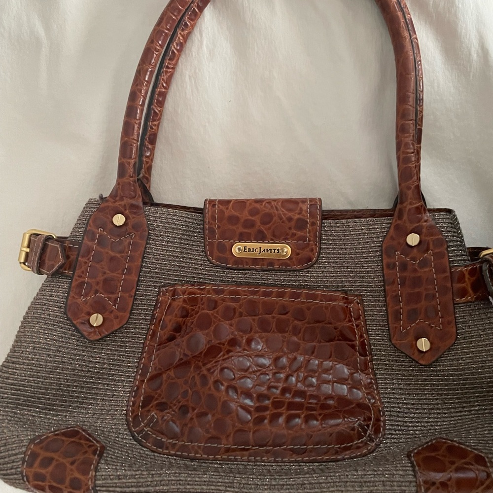 Gorgeous Eric Javits brown and gold straw purse with brown leather accents.